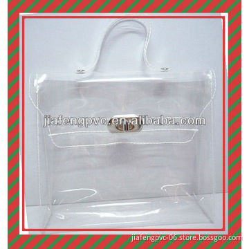 New Design Fashionable hand bag shape Clear PVC bag with metal swich button for cosmetic packing